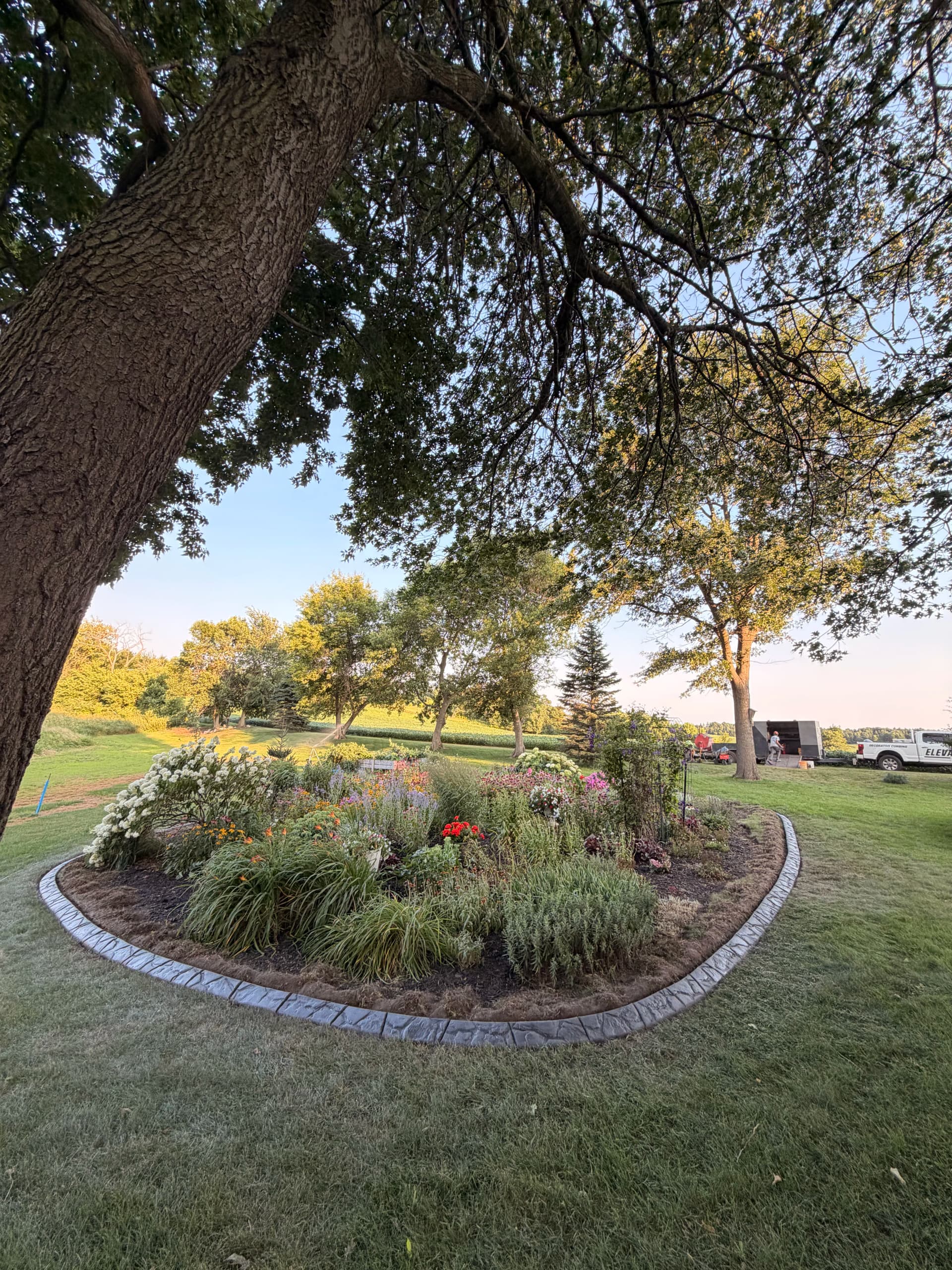 Concrete Curbing Gives This St. Stephen Yard a Sharp Finish image