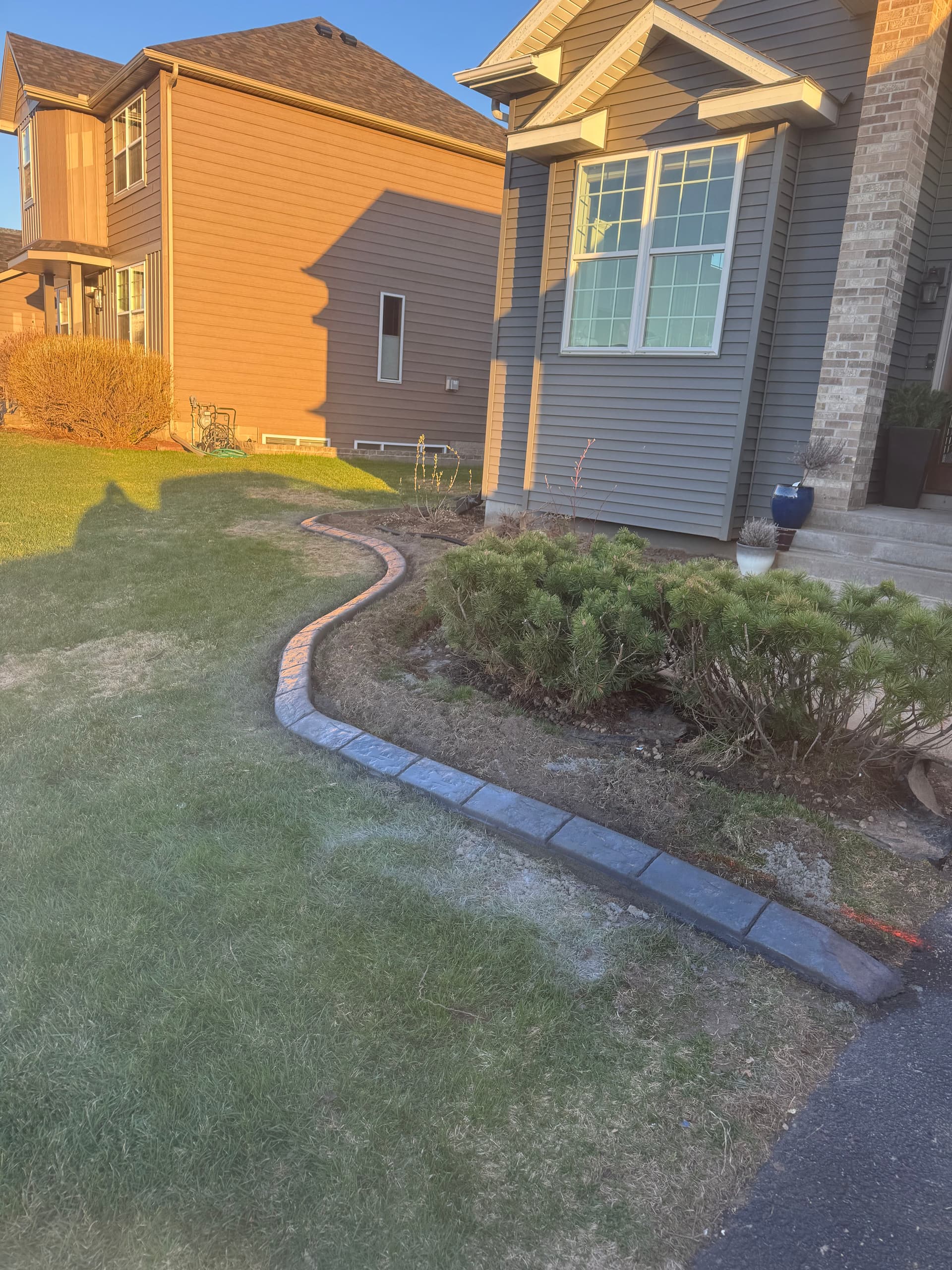 Charcoal Concrete Curbing With Heavy Spanish Stamp image
