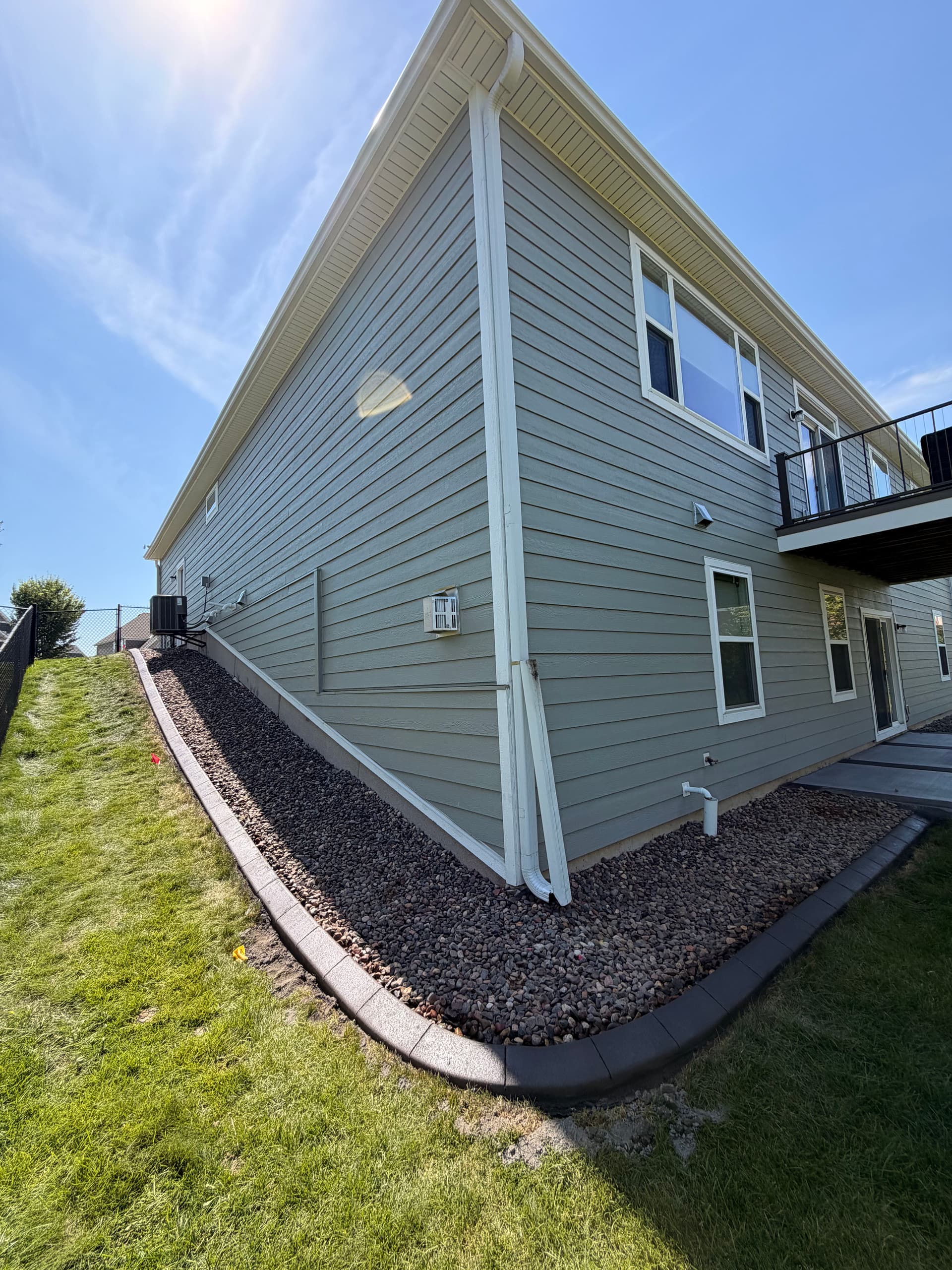 Gallery photos for Charcoal Concrete Curbing Gives Maple Grove Home Sharp Edges: Image #5