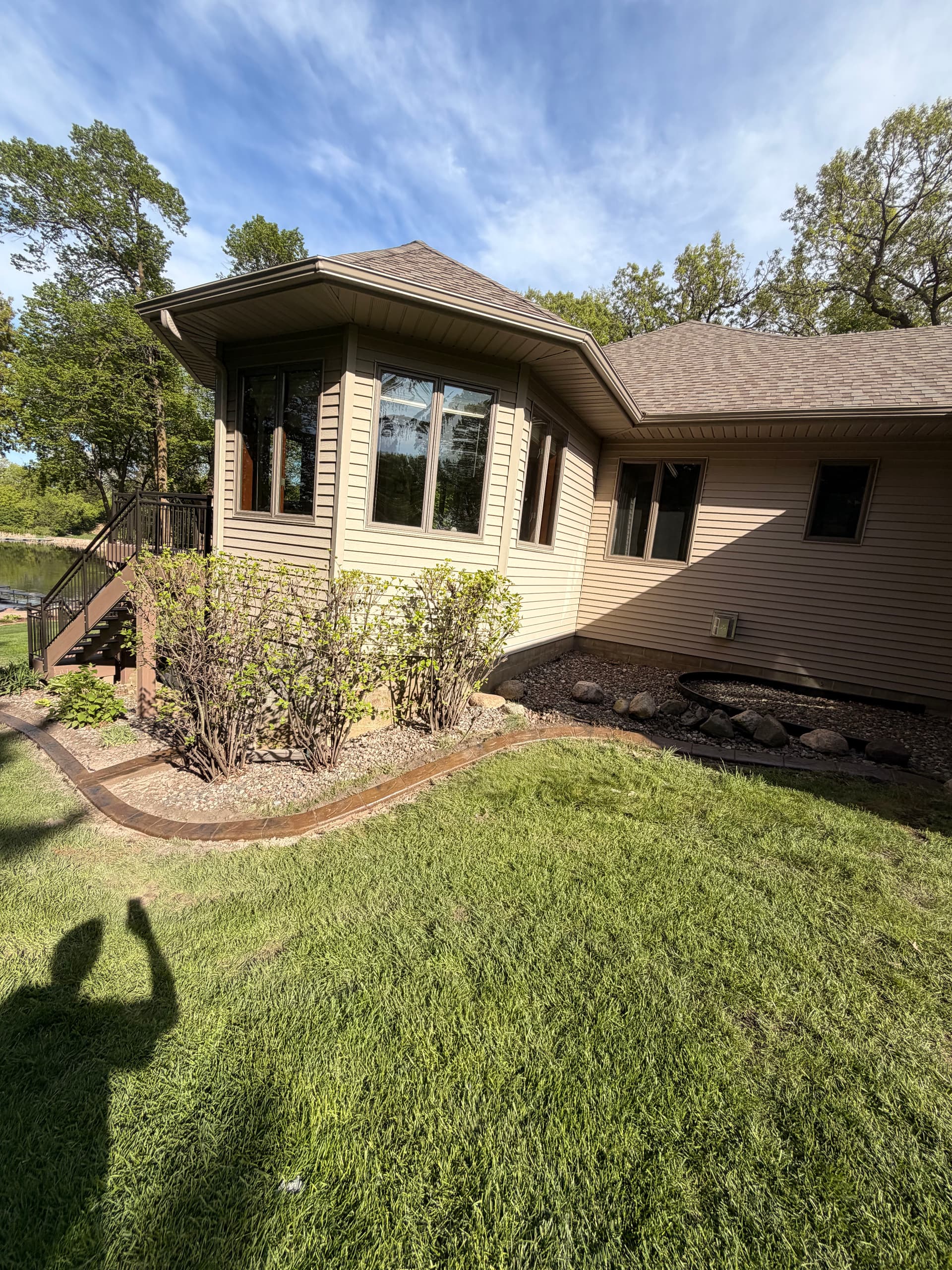 Gallery photos for Stamped Concrete Curbing with Custom Downspout Pads Upgrades Curb Appeal: Image #4
