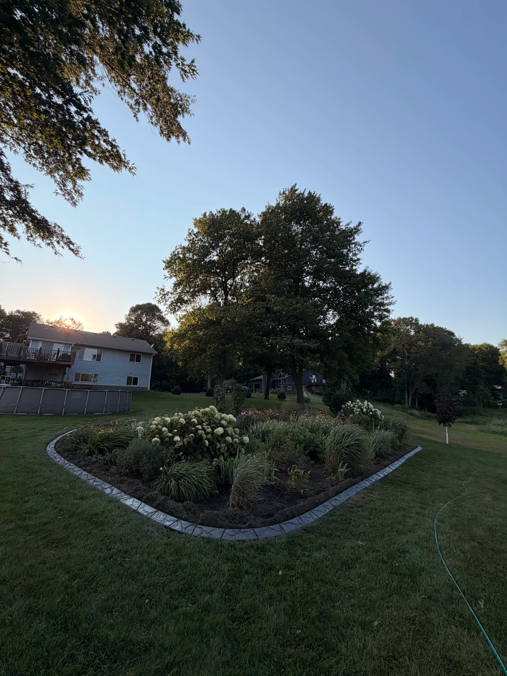Gallery photos for Concrete Curbing Gives This St. Stephen Yard a Sharp Finish: Image #1